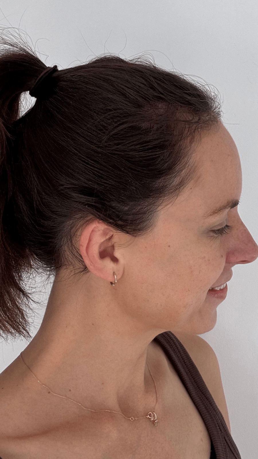 Woman with a ponytail showcasing her hair after using Bouf