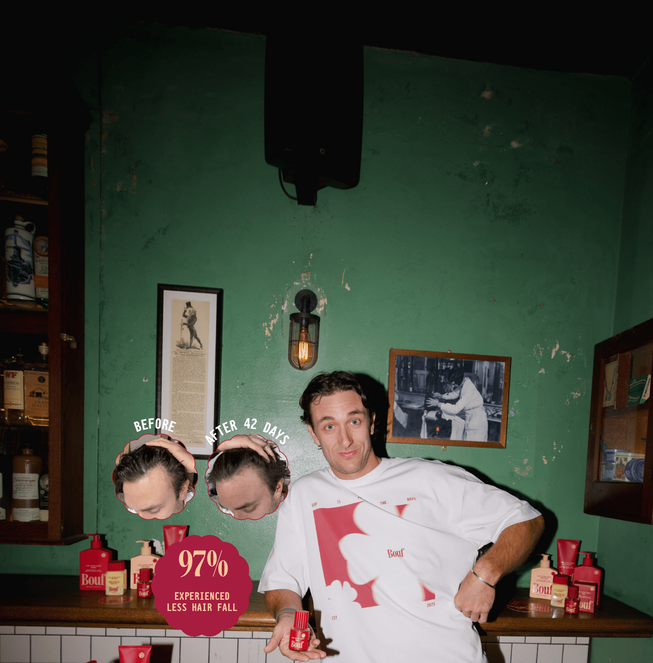 Man in a barbershop with Bouf products and promotional text on a green wall.