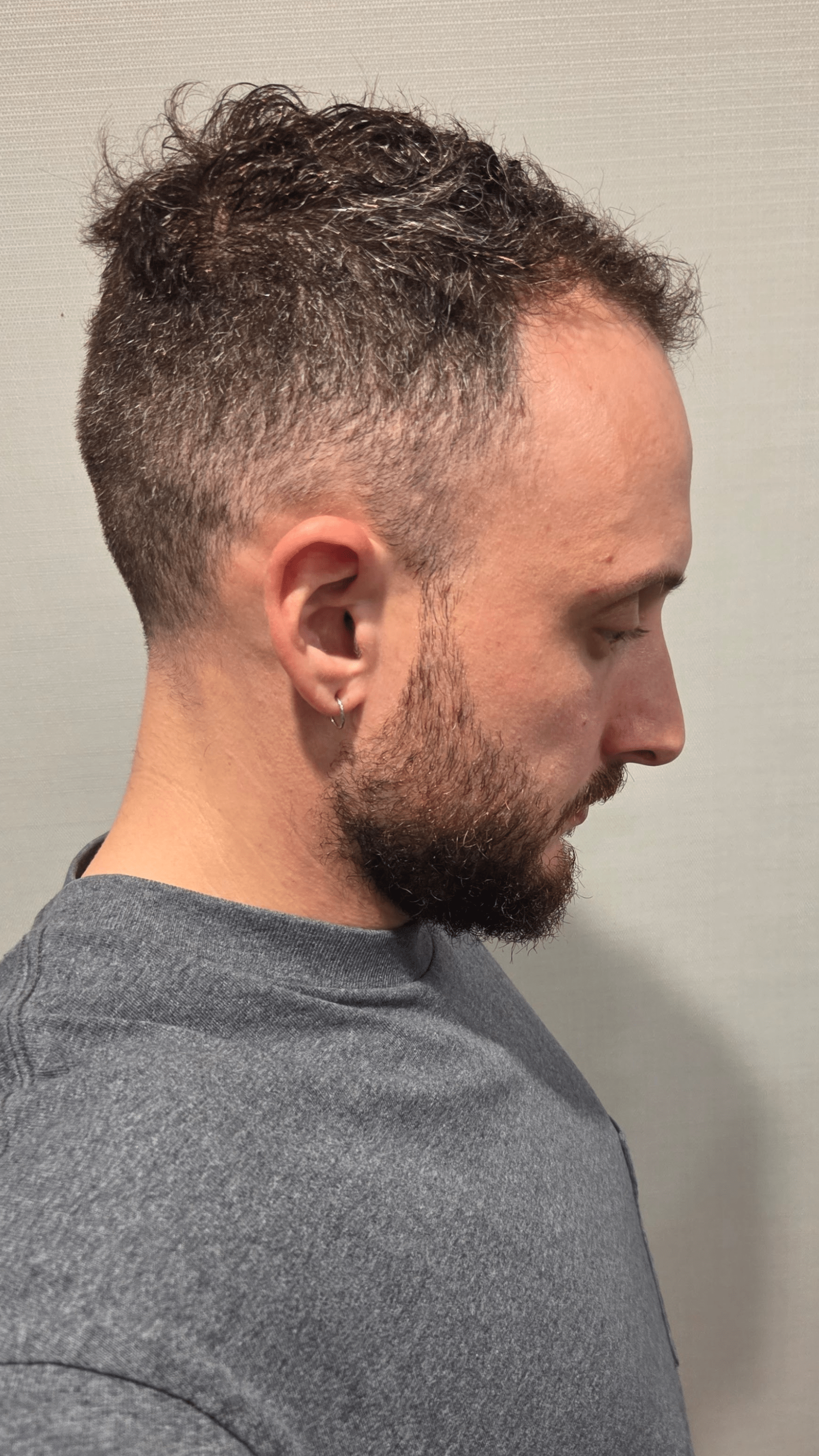 Mans hair before using Bouf against a plain background